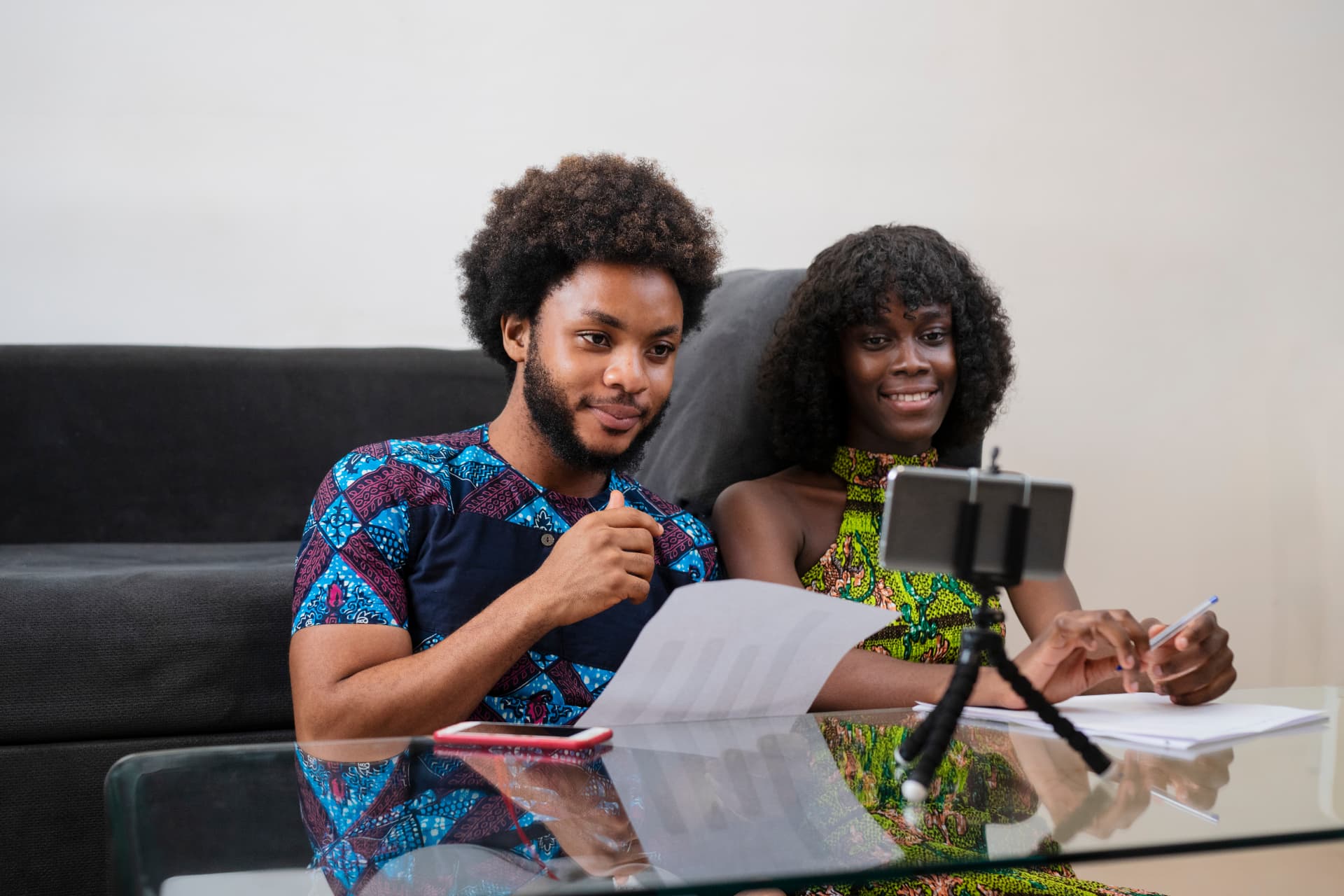 Two creators connecting with their community through an online meeting